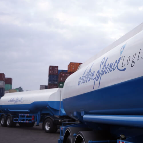 Oil tanker trucks parked in the yard