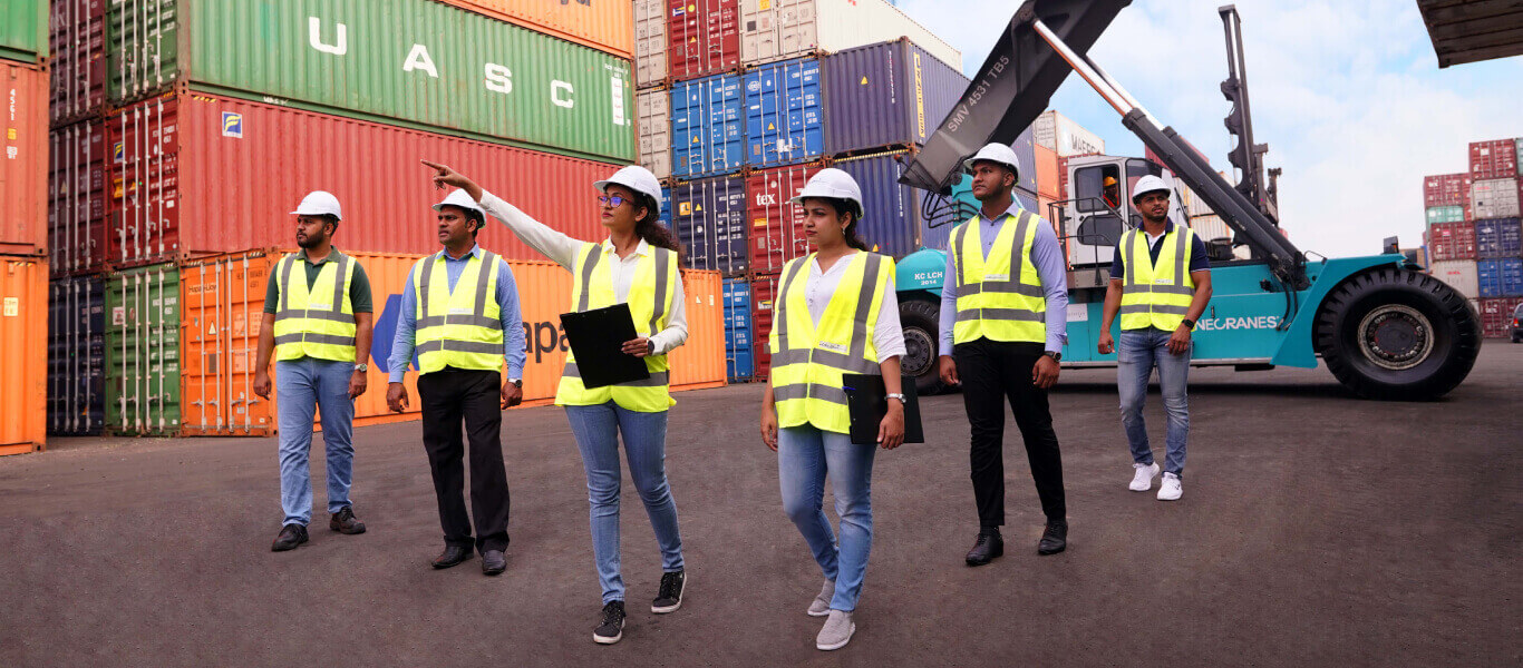 A group of workers go for a field visit in the yard